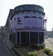 "a nightclub painted lurid lavender" (Google Street View Apr 2009)